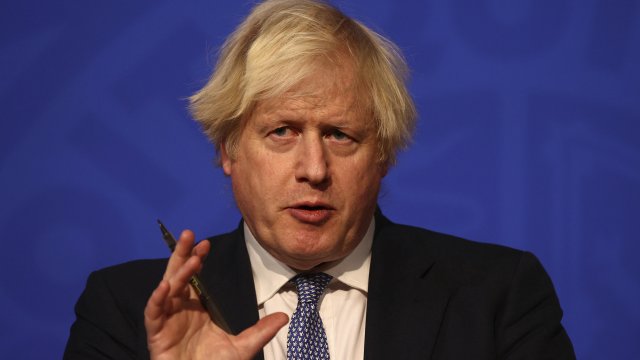 Britain's Prime Minister Boris Johnson speaks at a press conference in London's Downing Street.