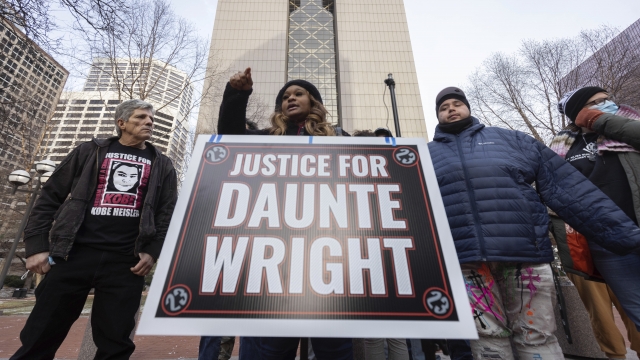Activists hold a press conference alongside the family of Daunte Wright