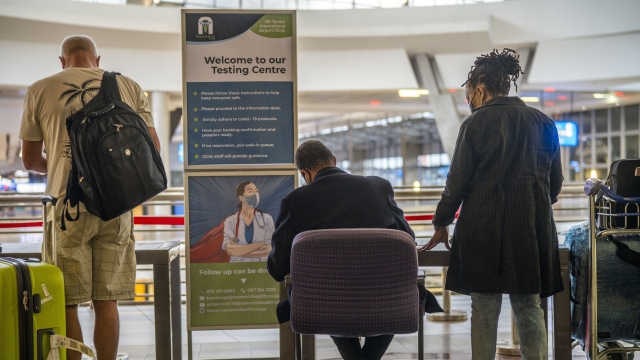 People lineup to get tested for Covid at OR Tambo's airport in Johannesburg, South Africa