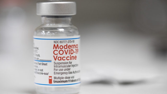 A vial of the Moderna COVID-19 vaccine is displayed