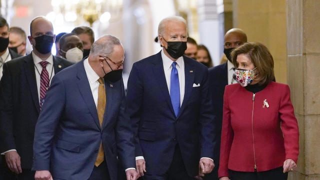 President Joe Biden with Senate Majority Leader Chuck Schumer and House Speaker Nancy Pelosi.