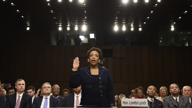 Former United States Attorney General Loretta Lynch stands.