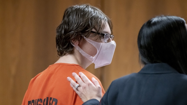 A teenage school shooting suspect attends a court hearing