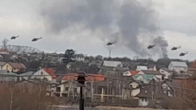 Military helicopters fly over Ukraine.