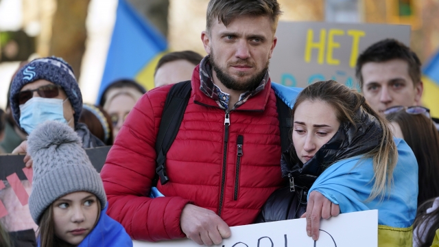 A Ukrainian couple who moved to the U.S. demonstrate against the Russian invasion