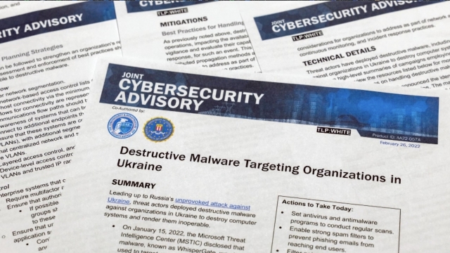 A briefing says "destructive malware targeting organizations in Ukraine."