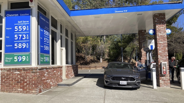 A motorist pumps gasoline at a gas station in Lafayette, CA