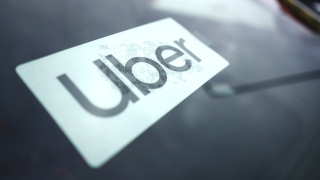 Uber sign displayed on car