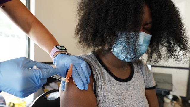 A person getting Pfizer COVID-19 vaccine.