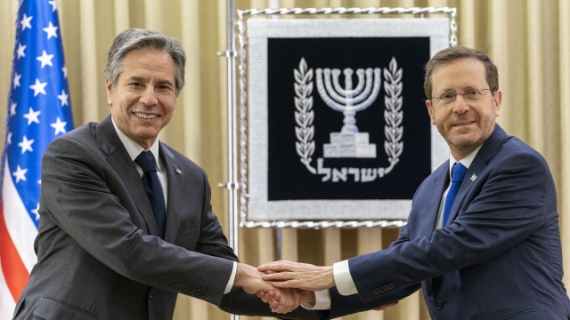 U.S. Secretary of State Antony Blinken, left, and Israel's President Isaac Herzog.