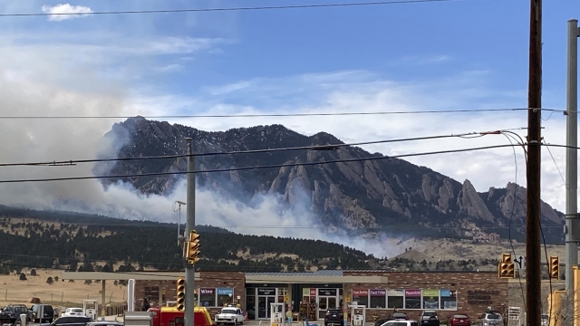Smoke billows from a wildfire a few miles south of Boulder, Colorado.