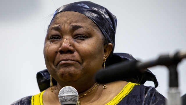 Patrick Lyoya's mother Dorcas Lyoya sheds tears during a news conference