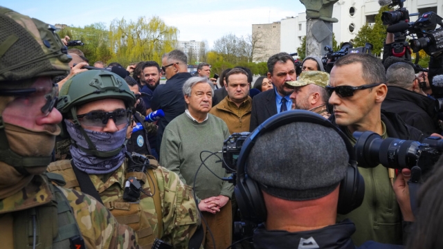 U.N. Secretary-General Antonio Guterres, center, reacts during his visit to Borodyanka in Ukraine