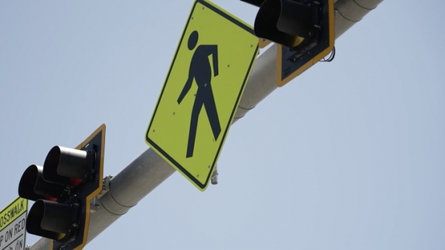 A pedestrian traffic sign
