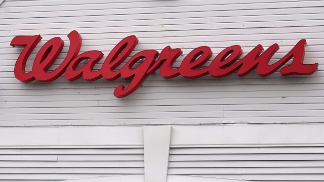 The Walgreens logo on the front of a store.