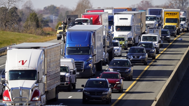Trucks haul supplies along Interstate 40 near Burlington, N.C.