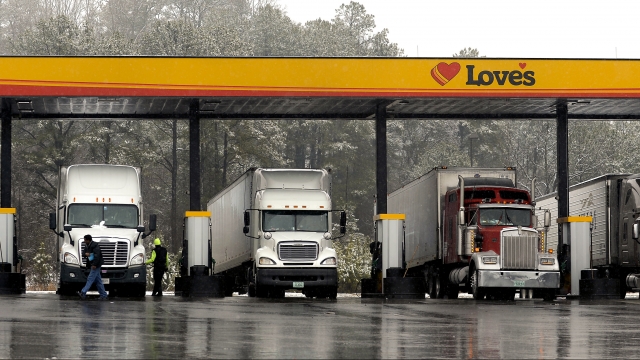 Truck drivers at a gas station