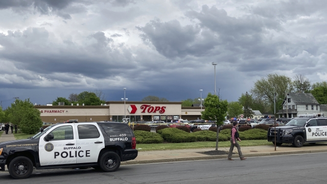 Buffalo Police respond to a shooting at Tops Friendly Market in Buffalo, N.Y.