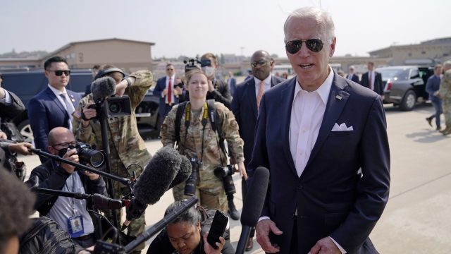 President Joe Biden speaks before boarding Air Force One for a trip to Japan