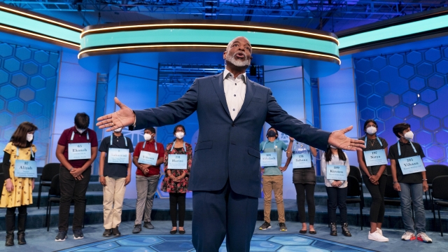 Actor LeVar Burton speaks as the twelve finalists of the Scripps National Spelling Bee
