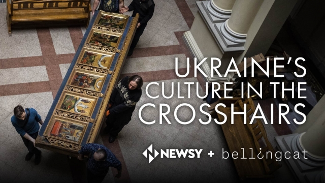 A religious art piece gets carried in a Ukrainian museum