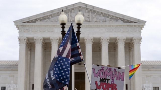 Abortion-rights activists protest outside of the U.S. Supreme Court on Capitol Hill in Washington.