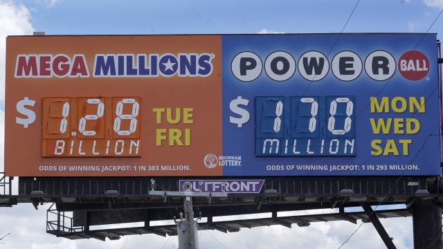 A sign displays the Mega Millions lottery jackpot in Detroit