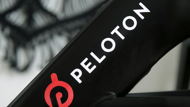 A Peloton logo is seen on the company's stationary bicycle
