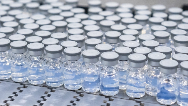 Pfizer shows vials of the company's updated COVID-19 vaccine during production in Kalamazoo