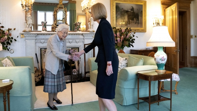 Britain's Queen Elizabeth shakes hands with Liz Truss at Balmoral, Scotland.