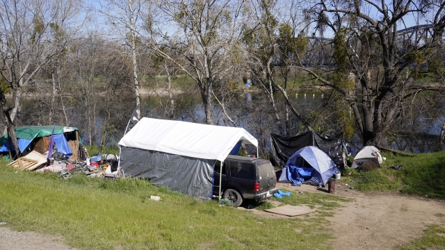 A variety of shelters make up one of the homeless camps along the American River Parkway in Sacramento