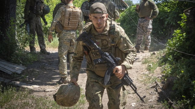 Ukrainian soldiers attend their positions, in the Donetsk region, Ukraine.