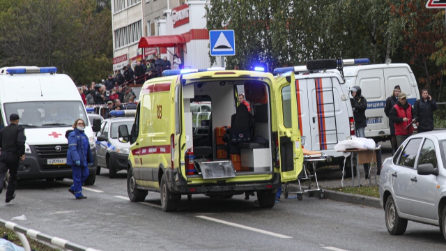 Police and paramedics work at the scene of a shooting at school No. 88 in Izhevsk, Russia.