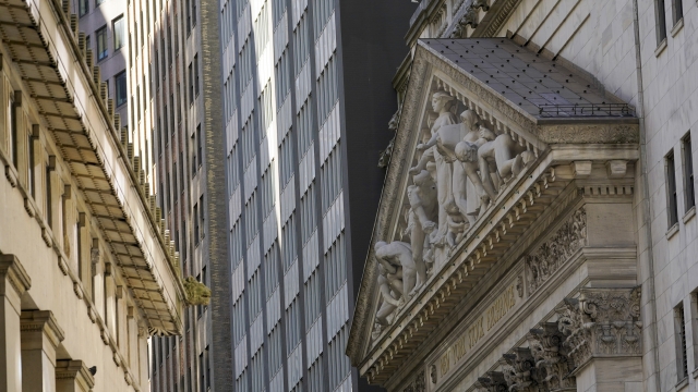 The New York Stock Exchange building is shown.