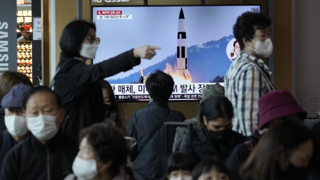A TV screen shows an image of North Korea's missile launch during a news program at the Seoul Railway Station in Seoul