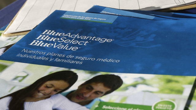 flyers promoting Blue Cross Blue Shield and Obama Care are on display to attract Hispanic customers