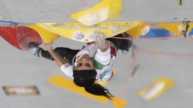 Iranian athlete Elnaz Rekabi competes during the IFSC Climbing Asian Championships