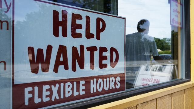 A "Help Wanted" sign displayed at a business.