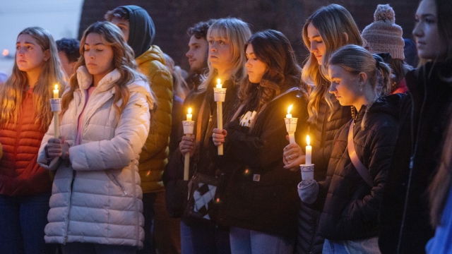 Students pay their respects at a vigil for University of Idaho students who were stabbed to death.