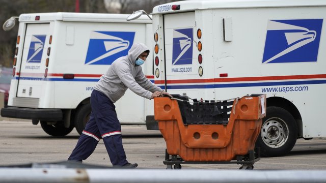A U.S. Postal Service worker