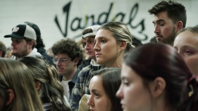 People attending a vigil for four University of Idaho students