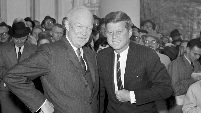 President Dwight Eisenhower poses with President-elect John F. Kennedy at the White House in Washington