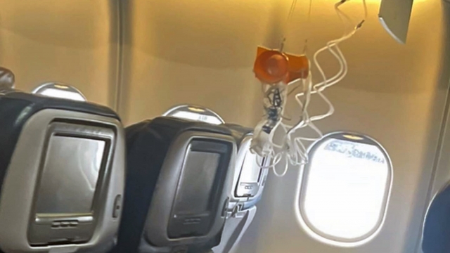 The interior of a turbulent Hawaiian Airlines flight.