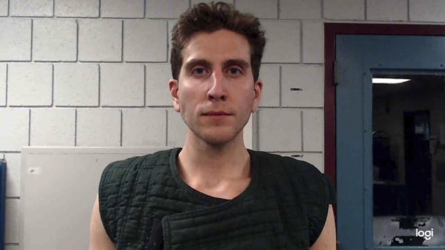 Suspect Bryan Kohberger, 28, stands for a mugshot