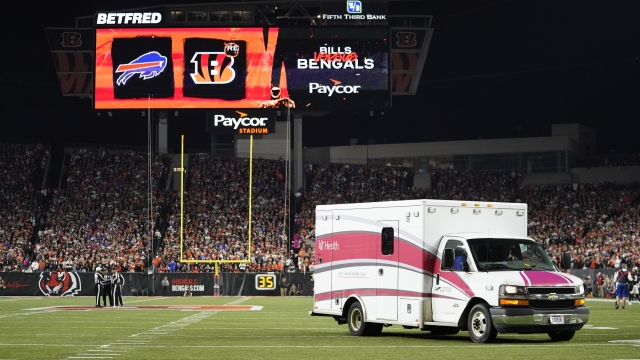 An ambulance leaves the field with Buffalo Bills' Damar Hamlin