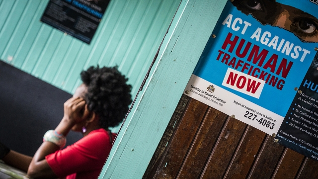 A sign promotes awareness of human trafficking