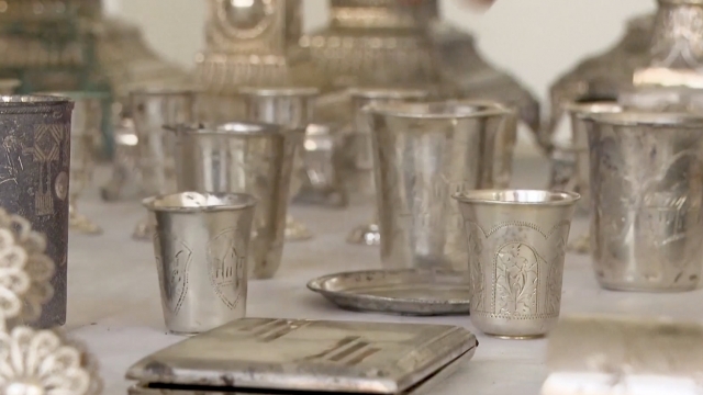 Silver cups are shown.