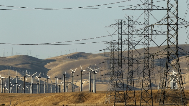 Electrical grid towers are shown.