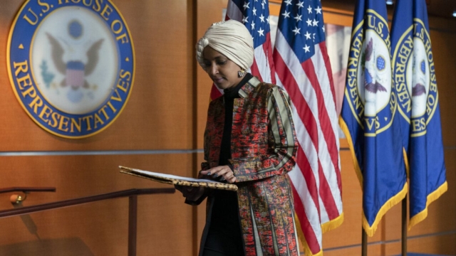 Rep. Ilhan Omar, (D) Minnesota, leaves a news conference.