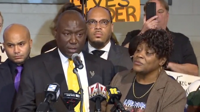 Ben Crump and Sonya Williams speak at a press conference.